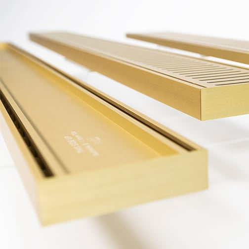 Drains with tile insert gold